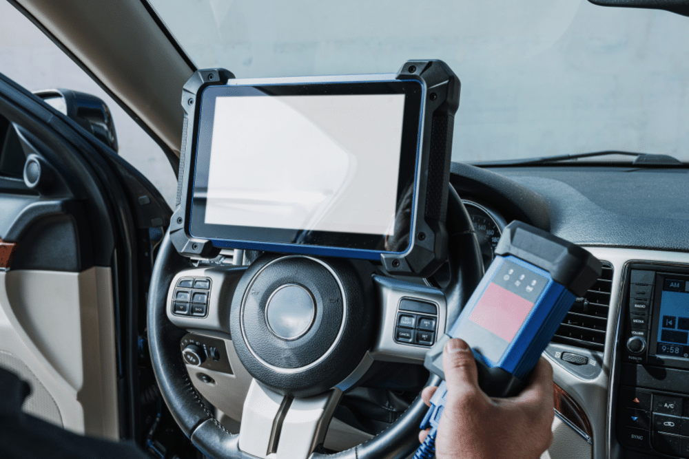 Alex's Autoworks Uses Digital Vehicle Inspections to Bring Transparency to Summer Vehicle Care in Hanover, PA. Image of A technician conducting a digital vehicle inspection
