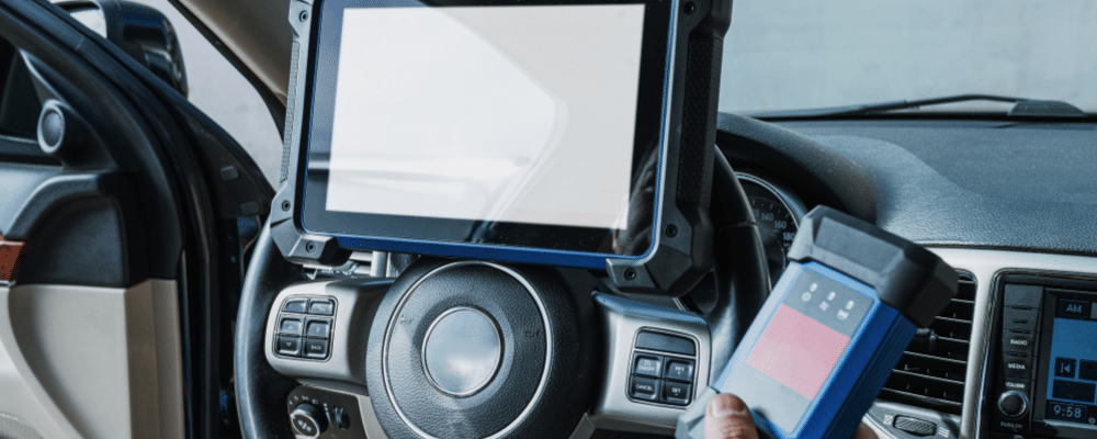 Alex's Autoworks Uses Digital Vehicle Inspections to Bring Transparency to Summer Vehicle Care in Hanover, PA. Image of A technician conducting a digital vehicle inspection