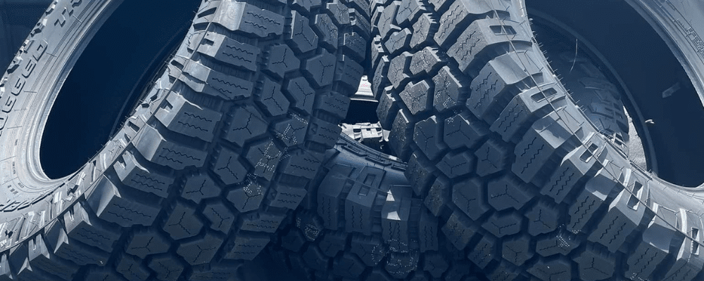 Tire repair in Hanover, PA by Alex’s Autoworks. Image of all-terrain Cooper Discoverer Rugged Trek tires, showcasing the shop’s commitment to traction, durability, and safe performance for off-road and daily driving needs.