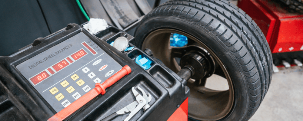 Tire rotation and balancing, auto repair in Hanover, PA by Alex’s Autoworks. Image of a digital wheel balancer and mounted tire during service. Highlighting Alex’s Autoworks’ commitment to smooth handling, performance, and driver safety.