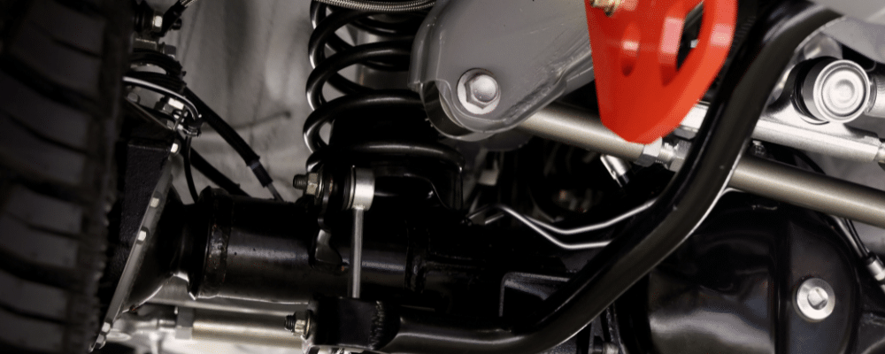 Steering and Suspension Repair at Alex's Autoworks At Alex's Autoworks. Image of Close-up view of a vehicle suspension